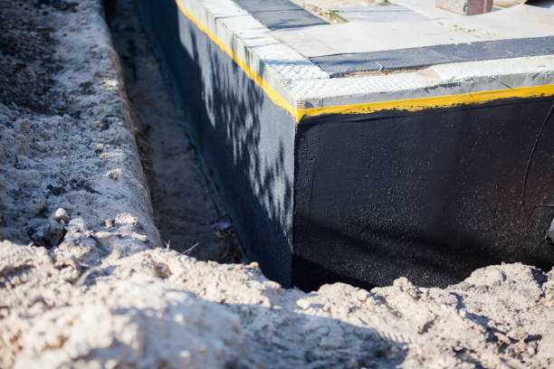 Professional Waterproofing technician working in Spencerville, OH